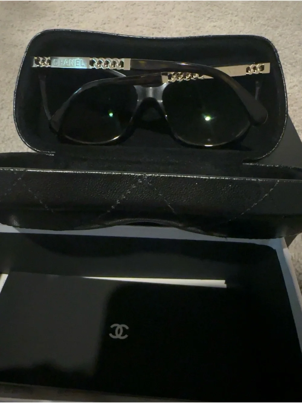 CHANEL Black Cat-Eye Sunglasses with Gold Accent